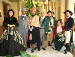 Historic characters roam the streets of New Orleans during the winter holidays.